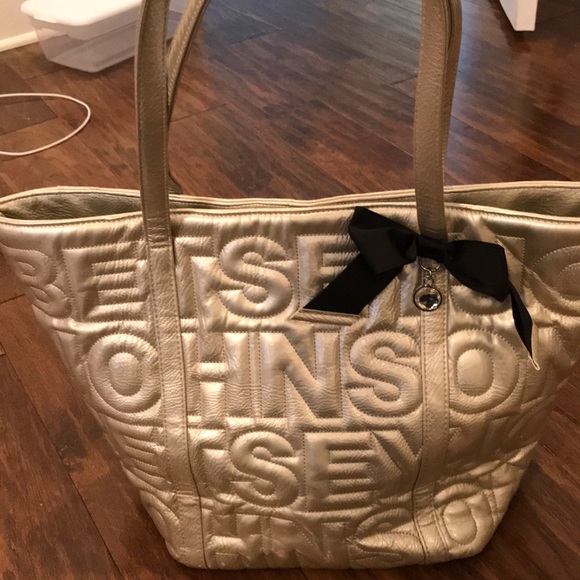 Betsey Johnson Handbags - Betsy Johnson silver bag, tote, purse with bow!